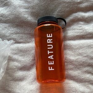 Feature Orange Water Bottle